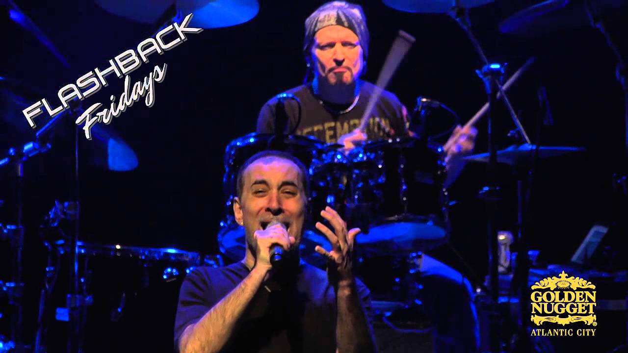 Journey tribute band performing