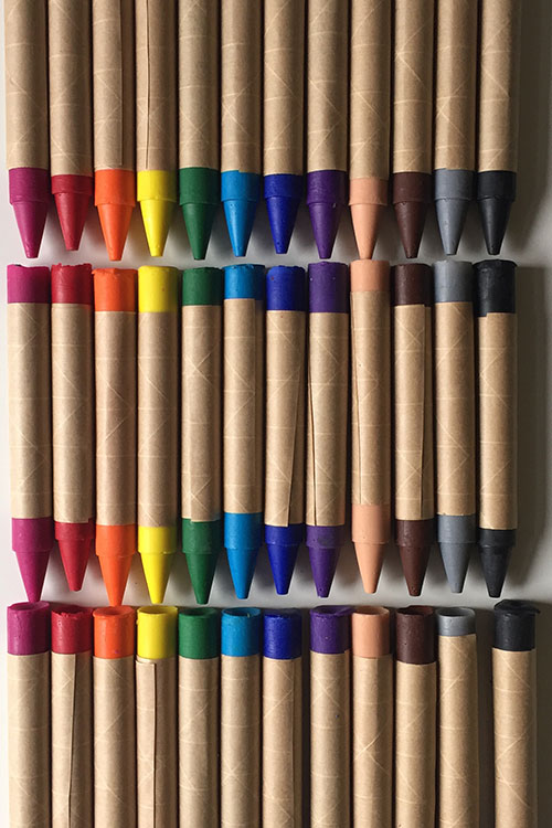 Colorful crayons on a table during a children's crafting event