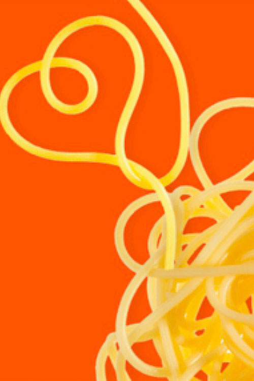 Spaghetti noodles forming heart