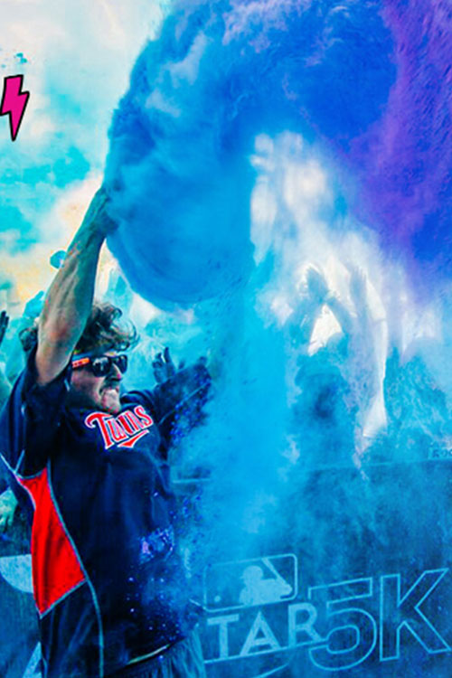 Twins Baseball fans celebrating with colored powder