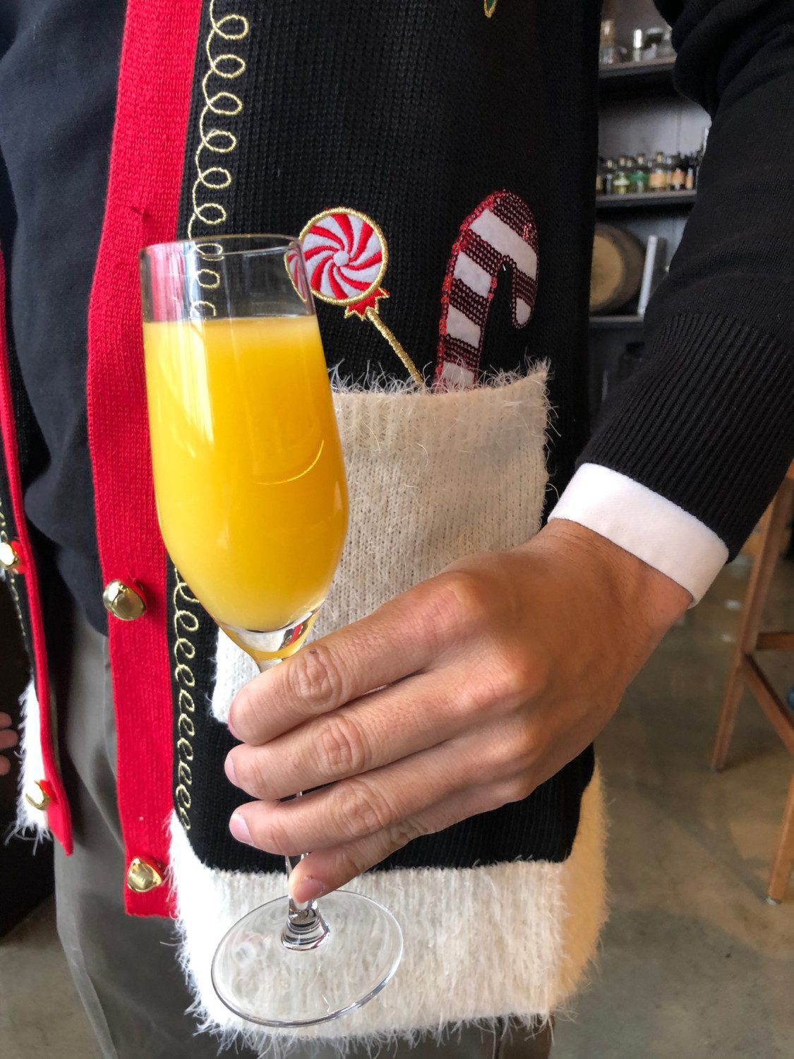 Woman holding champagne cocktail